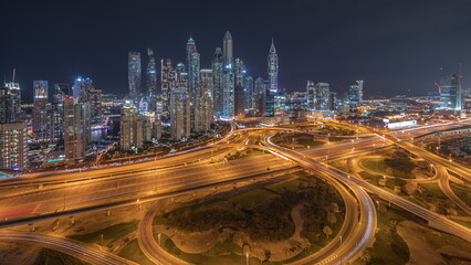 Wall Mural - Dubai Marina highway intersection spaghetti junction night timelapse
