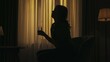 © kinomaster - Everyday life creative concept. Woman sitting on a chair holding glass of water, feeling unwell because of heat.