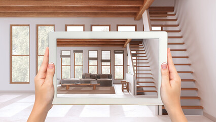 Wall Mural - augmented reality concept. hand holding tablet with ar application used to simulate furniture and de