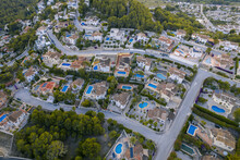 Aerial View Of Holiday Villas With Pools In A Residential Area, Zona Encinas, Cumbre Del Sol, Alicante, Spain.