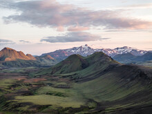 Aerial View Of A Beautiful Mountain Landscape With Torfajokull Mountain In Background At Sunset In The Highlands Near Hella, Southern Region, Iceland.