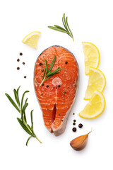 Wall Mural - One fresh raw salmon steak surrounded by ingredients, top view of a piece of red fish isolated on a white background