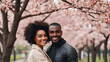 Close-up portrait of a happy man and woman of different nationalities in a park in spring. Multiracial romantic youth concept.
