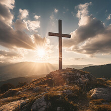 Silhouette Of Christian Cross On A Hill. Sunset, Golden Hour. Religion Concept.
