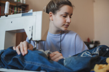 A young seamstress sews a wardrobe and develops her small business