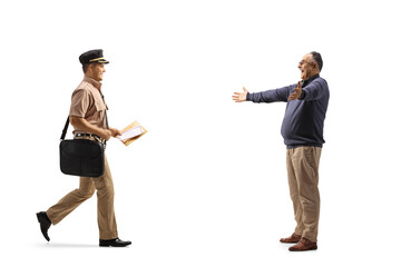 Wall Mural - Mailman delivering a letter to a happy mature man