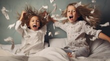 Two Little Girls Jumping In The Air On A Bed