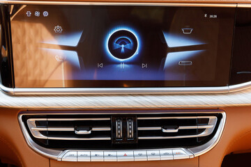 large touch screen media system in the бгчгкнcar interior