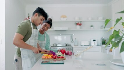 Sticker - Love, vegetables and a couple cooking in the kitchen of their home together for health, diet or nutrition. Food, lunch or dinner with a man and woman in a house to prepare a healthy vegan meal