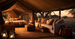 Luxury safari tent set up in the wilderness, complete with plush furnishings and a private view of the savanna