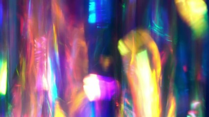 Wall Mural - Optical light refraction. The light passes through the facets of a prism and creates repetitive sparkling highlights and rainbow colors. Fairy Christmas Lights Bokeh