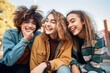© Salsabila Ariadina - Diverse cool teens at the city skate park bonding and having fun