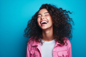 Studio portrait of beautiful teenage girl on different colours background