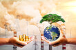 Concept of capitalism and nature conservation, hand holding money and hand holding environment can be used in work related to environmental conservation and saving the world.