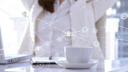 Poster - Animation of connected icons over happy caucasian woman raising hands while sitting on chair