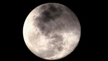 Close Up Video Of The Full Moon Standing Directly Below The Big And Prominent Planet We See Every Night During The Early Hours Of The Morning On A Grey And Overcast Day In The South Of England.