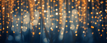 Holiday Illumination And Decoration Concept - Christmas Garland Bokeh Lights Over Dark Blue Background