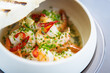 Shrimp pil-pil. King prawns, garlic, chilli and baguette. Delicious Spanish traditional food closeup served for lunch in modern gourmet cuisine restaurant