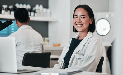 Poster - Scientist, woman and portrait at laptop in laboratory for innovation, research and biotechnology software. Happy asian science technician working online to review data, investigation and development