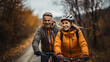 © TimeaPeter - Father and daughter riding electric bike in autumn forest.