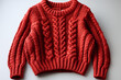 © Werckmeister - Red knitted sweater background with traditional design, Knit woolen texture. Red knitted Christmas turtleneck sweater