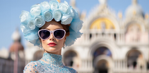 Wall Mural - a young woman in a headdress of flowers attends a carnival, festival on a bright sunny day