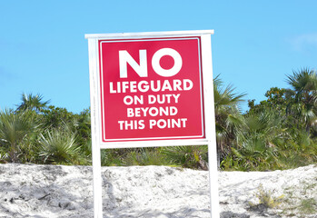 Sign warning that there is no lifeguard on duty