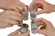 A group of men clink hands glasses chilled vodka alcohol feast, holiday, celebration on white isolated background, close up