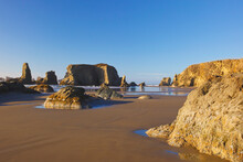 Rock Formations At Low Tide On Bandon Beach; Oregon United States Of America