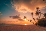 Fototapeta Most - Best most exotic travel landscape. Majestic sunset beach. Coconut palm tree silhouettes, fantastic colorful sky clouds. Closeup waves sand. Stunning tropical nature scene, panoramic island paradise