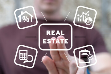 Wall Mural - Real estate agent or client using virtual touch screen presses inscription: REAL ESTATE. Concept of real estate taxes, insurance, investment. Real estate market growth.