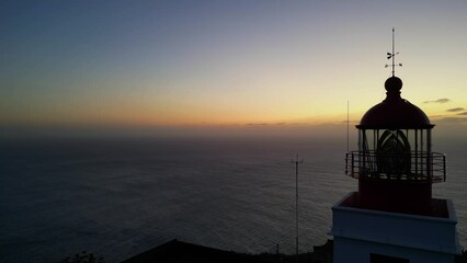 Wall Mural - Stunning sunset drone footage from Lighthouse Ponta do Pargo 