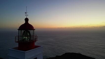 Wall Mural - Stunning sunset drone footage from Lighthouse Ponta do Pargo 