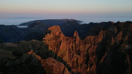 Wall Mural - Stunning sunrise aerial dron footage from Pico do Arieiro with beautiful clouds