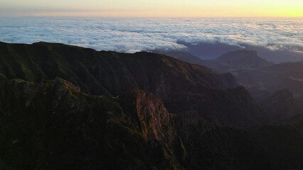 Wall Mural - Stunning sunrise aerial dron footage from Pico do Arieiro with beautiful clouds