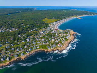 aerial view of historic waterfront buildings next to good harbor beach in gloucester, cape ann, mass