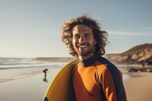 Smiling Portrait Of A Happy Male Caucasian Surfer In Australia On A Beach