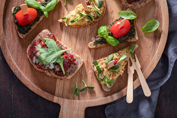 Wall Mural - Tasty bruschetta made of bread and vegetables for a snack