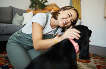 Poster - Love, smile and woman with dog in home lounge to relax and play with animal. Pet owner, happy and asian person on floor with companion, care and wellness or friendship and together in cozy apartment