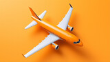 Fototapeta Boho - Top view of orange background and airplane