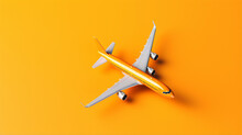 Top View Of Orange Background And Airplane