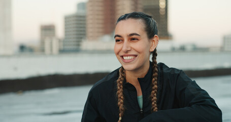 Canvas Print - Fitness, smile and woman athlete in the city for a health, wellness and cardio workout or exercise. Happy, sports and young female person on a rest or break after training on rooftop in urban town.