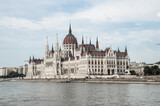 Fototapeta Lawenda - View of Hungarian Parliament in Budapest from Danube River.