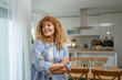 © Miljan Živković - Portrait of one adult caucasian woman at home happy smile curly hair