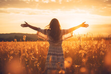Happy Woman Raised Her Hands Up In A Beautiful Meadow During Sunset. Woman Enjoying Life At Sunset In A Field With Wildflowers. Generative AI