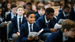 © Georgina Burrows - Group of elementary school students sitting in an auditorium during an assembly