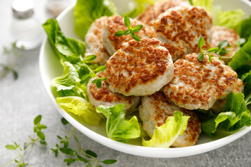 Canvas Print - Chicken patties, cutlets with fresh salad