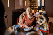 © Marko Geber - Young and diverse group of friends washing dishes after breakfast in their flatshare apartment