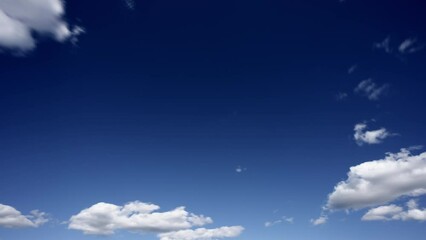 Wall Mural - timelapse of clouds on a blue sky on summer sunny day