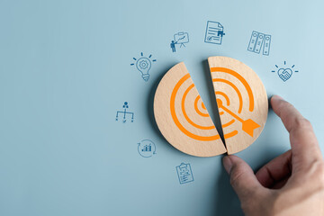Aufkleber - Hand holding objective aiming target which for planning development leadership and customer target group for start business to goal achievement.